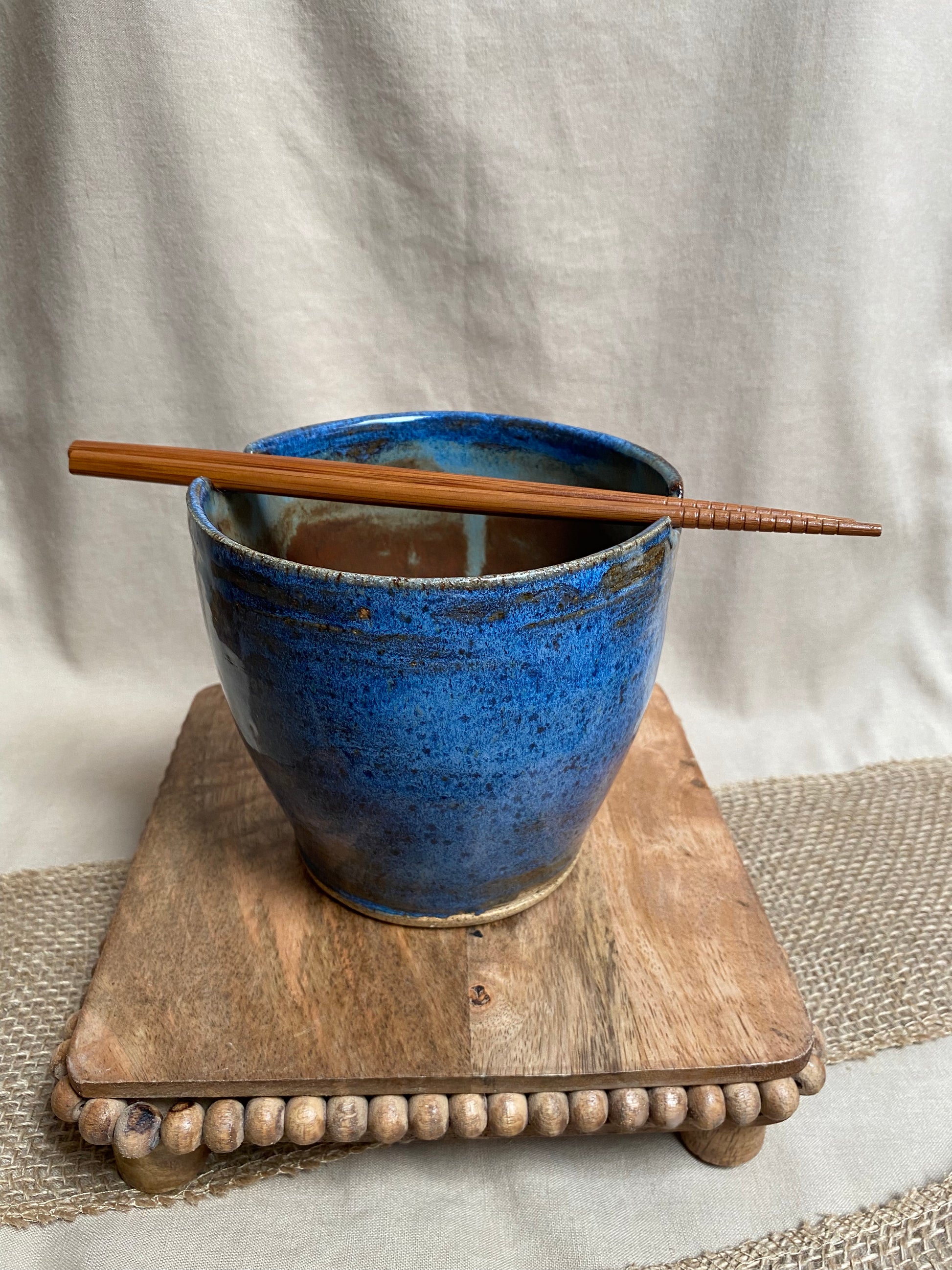 blue bowl with chopsticks