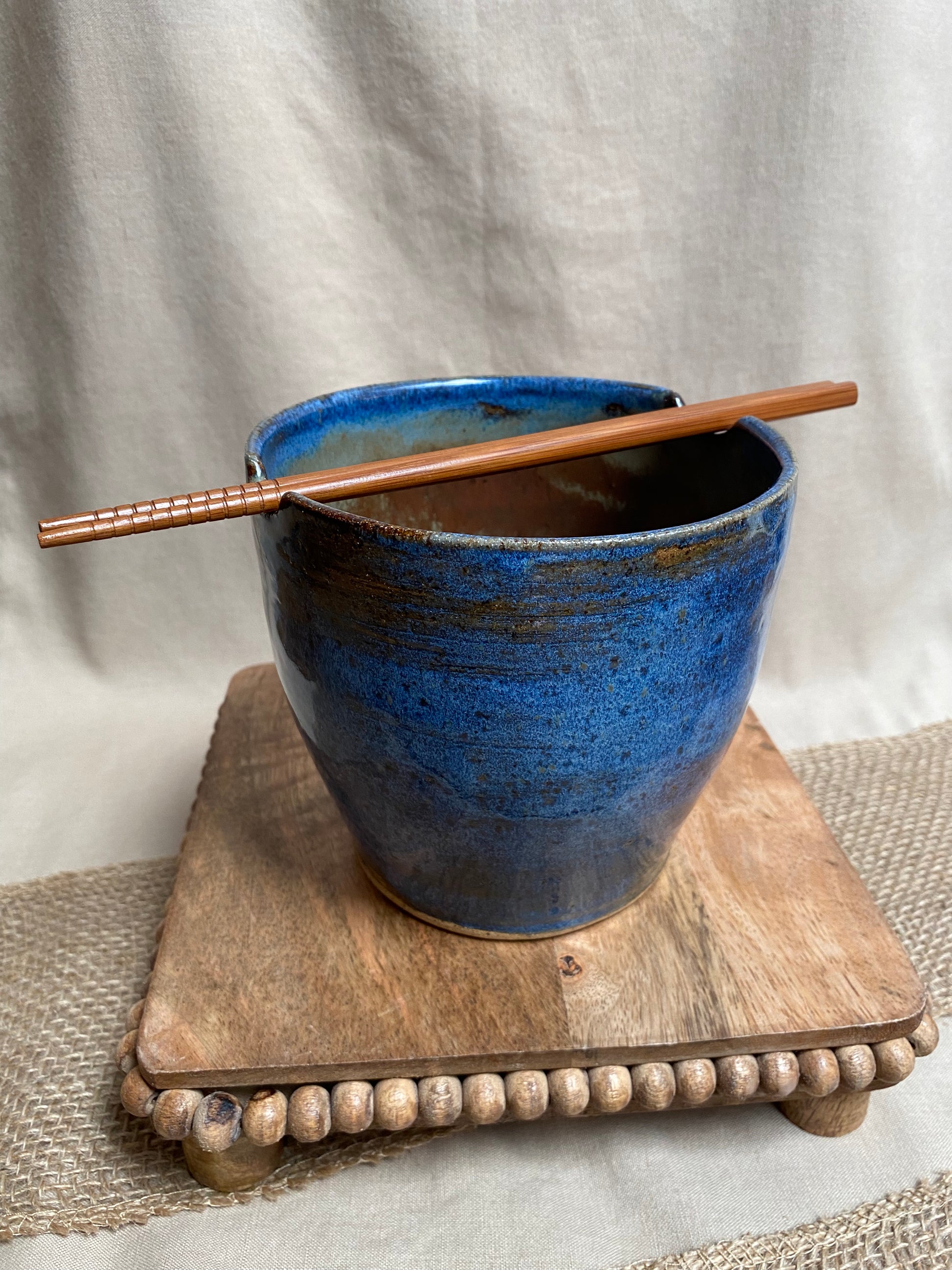 blue bowl with chopsticks