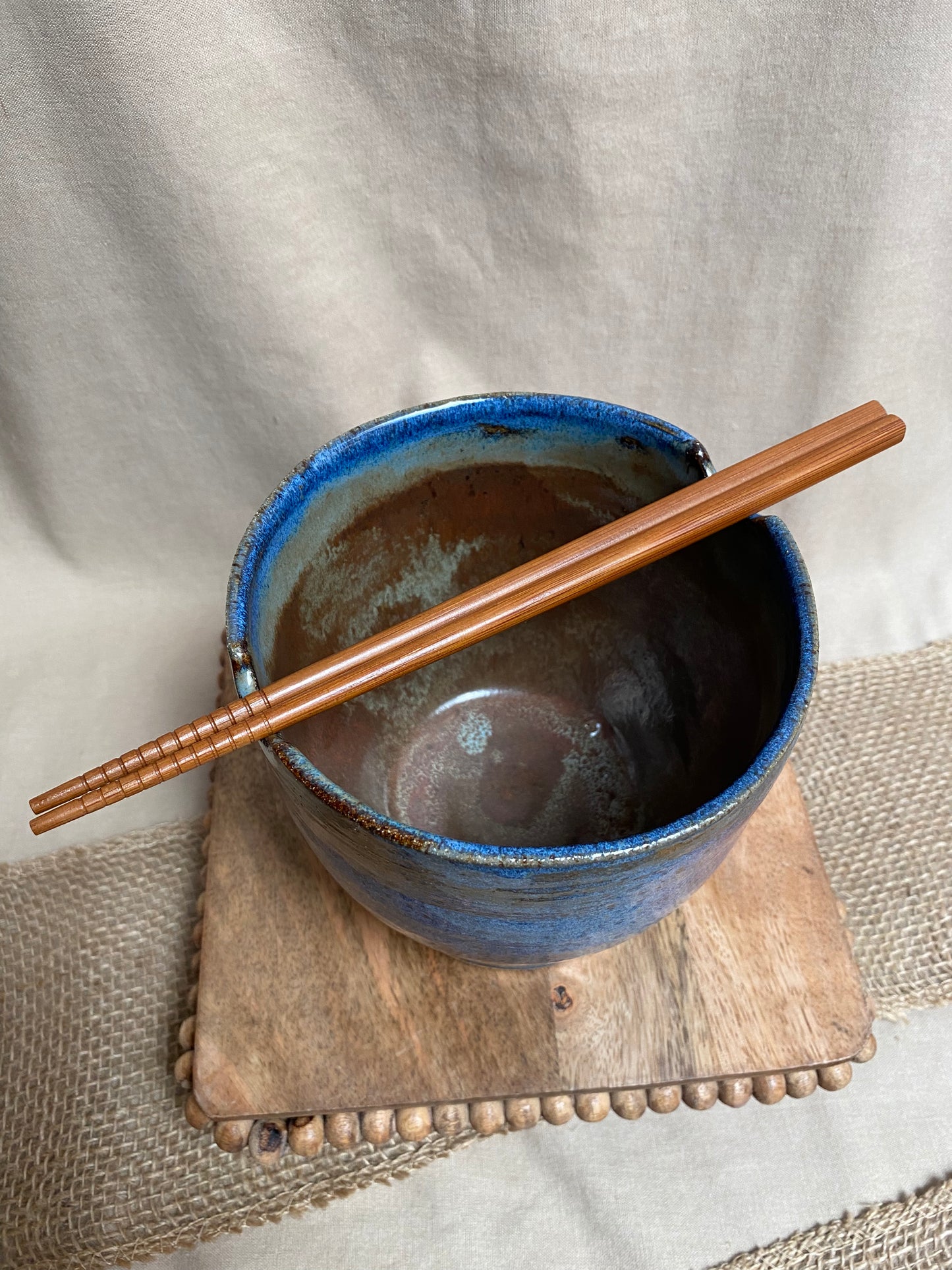 blue bowl with chopsticks