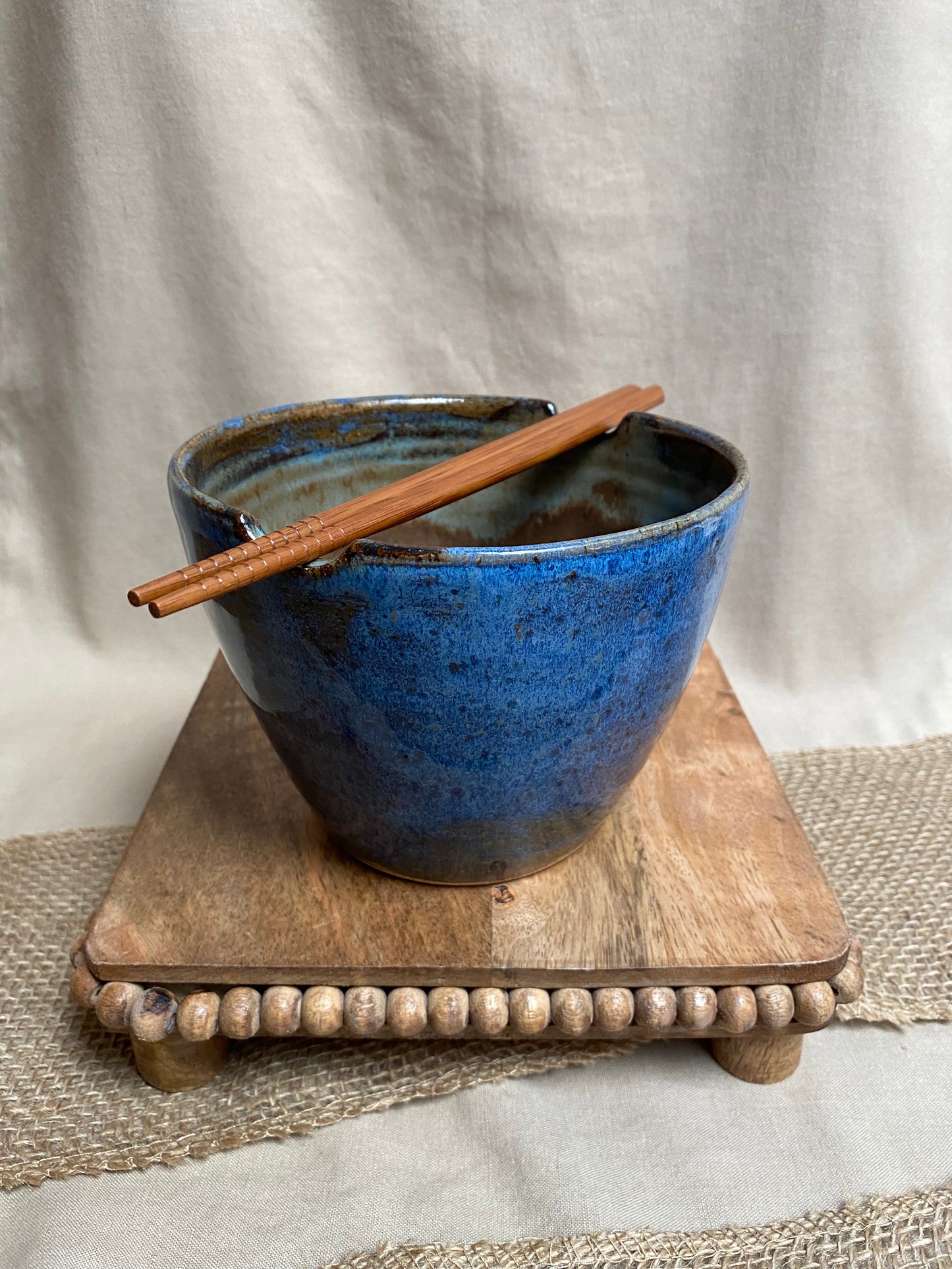 blue bowl with chopsticks