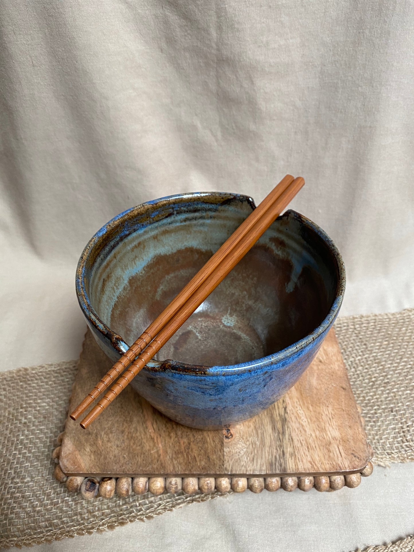 blue bowl with chopsticks