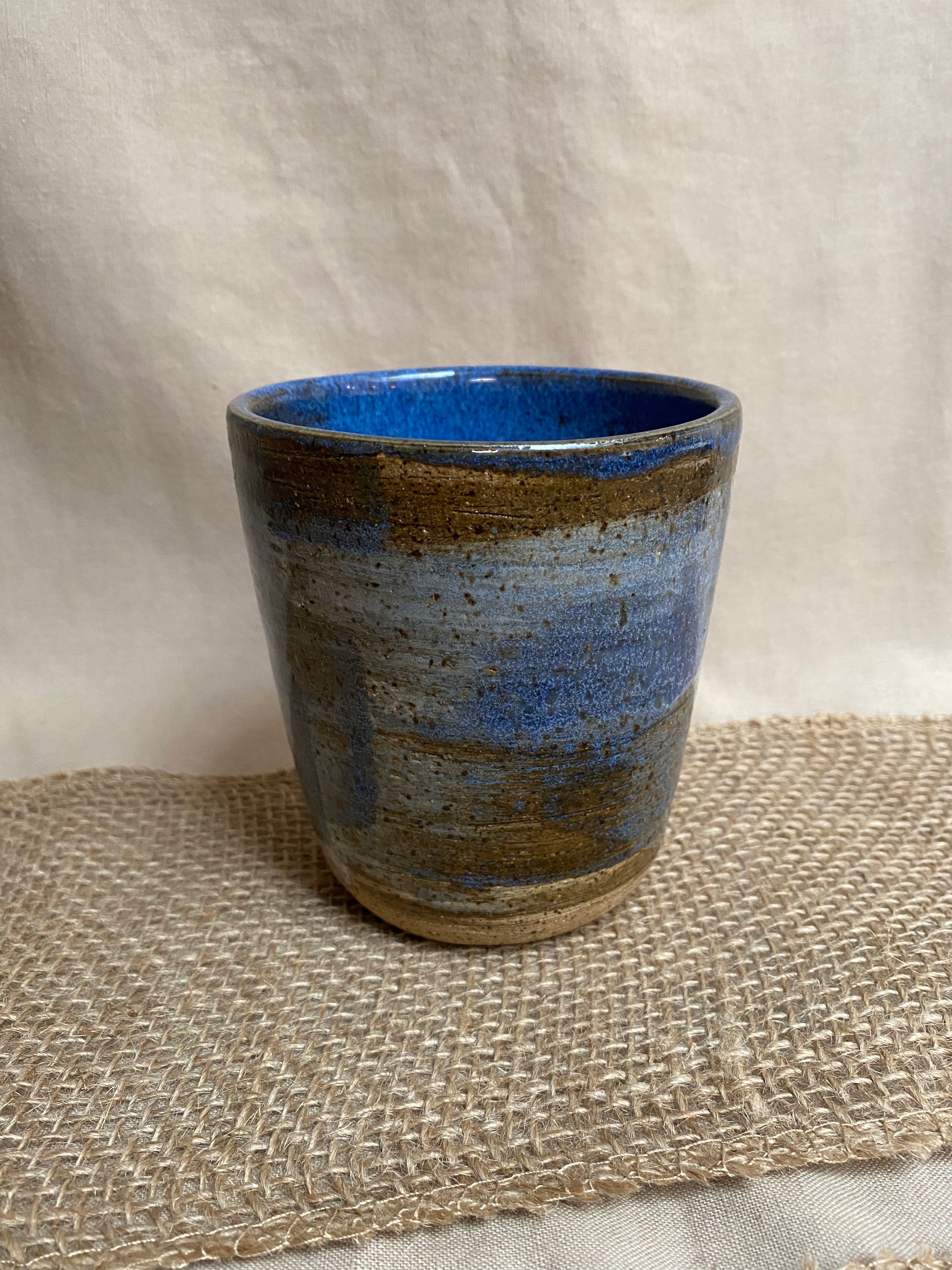 blue and brown tumbler